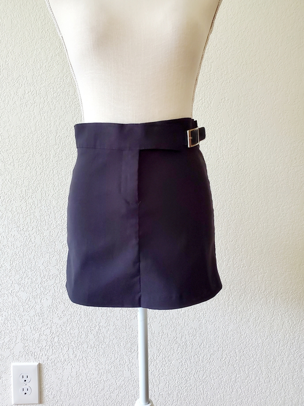 Finesse Black Mini Skirt with Side Buckle Detail